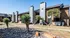 Charming apartment complex with contemporary architecture, lush landscaping, and inviting outdoor spaces.