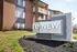 Inviting apartment complex exterior with modern signage and well-maintained landscaping at ReNew Foundry Centre.