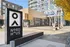 Modern commercial space with eye-catching architecture, featuring Nord Haus signage and vibrant surroundings, perfect for business expansion.