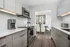 ReNew Waterside Modern Kitchen with Gray Cabinets and Stainless Steel Appliances