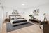 Elegant bedroom with a modern design, featuring a comfy bed, stylish decor, and natural light accentuating the cozy ambiance.