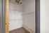 Spacious walk-in closet with modern shelving and ample storage space.