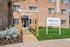 Inviting entrance to the ReNew Springfield leasing office with modern landscaping and welcoming signage.