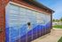 Vibrant outdoor parcel locker with modern design at The Social Blue apartment complex, enhancing convenience and security for residents.