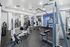 State-of-the-art fitness center featuring modern Cybex and Nautilus equipment with bright, inviting interiors.