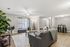Inviting living area with modern furnishings, cozy seating, and stylish decor, perfect for relaxing and entertaining.