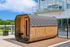 Modern apartment rooftop with a charming wooden sauna hut, offering a perfect blend of urban luxury and relaxation.