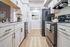 Sleek modern kitchen with stainless steel appliances, elegant cabinetry, and stylish marble countertops.