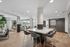 Modern communal lounge with stylish seating, natural light, and sleek decor, perfect for relaxing and socializing.