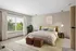 Inviting bedroom with large window, plush bedding, stylish pendant lighting, and calming neutral tones.