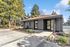 Charming residential facility with modern architecture, surrounded by lush greenery and a sparkling pool, offering a tranquil and inviting atmosphere.