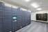 Modern package room with sleek Amazon lockers and convenient individual mailboxes, offering secure and hassle-free delivery services.