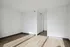 Bright, spacious room with sleek hardwood floors and modern white walls, offering a clean slate for personalized d&eacute;cor.