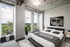 Sleek bedroom featuring a modern platform bed, large windows with scenic views, and contemporary artwork, ideal for urban living.