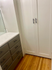 large closet with cabinets and storage