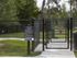 Dwell Nona Place, exterior, Bark Park dog park, entrance, rules sign