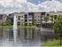 Dwell Nona Place, exterior, lake, fountain, 3 story building,