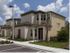 Dwell Nona Place, exterior, entrance two level building, parking