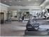 Dwell Nona Place, interior, fitness center, weight machines, treadmills, elliptical