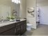 Dwell Nona Place, interior, bathroom, double sink vanity, shower/tub, closet