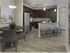 Dwell Nona Place, interior, dining room, kitchen, breakfast bar island seating, dark cabinets, stainless steel appliances,