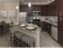 Dwell Nona Place, interior, dining room, kitchen, breakfast bar island seating, dark cabinets, stainless steel appliances,