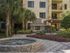 Dwell Maitland, exterior, courtyard zen garden with fire place