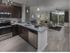 Dwell Maitland, interior, magnesium kitchen with view to living room