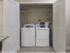 Dwell Maitland, interior, magnesium laundry room, full size washer/dryer