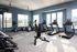 Fitness center at Seasons at Mount Pleasant Apartments in Mount Pleasant, Wisconsin equipped for cardio and strength training.