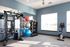 Fitness center at Seasons at Mount Pleasant Apartments in Mount Pleasant, Wisconsin equipped for cardio and strength training.