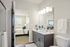 Bathroom at Seasons at Mount Pleasant Apartments in Mount Pleasant, Wisconsin featuring updated fixtures and finishes.