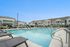 Resort-style swimming pool at Seasons at Mount Pleasant Apartments in Mount Pleasant, Wisconsin offering space for outdoor relaxation and resident use.