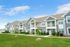 Exterior view of resident apartment buildings at Seasons at Mount Pleasant Apartments in Mount Pleasant, Wisconsin.