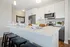 Apartment kitchen at Seasons at River View Apartments in Pleasant Prairie, Wisconsin with updated cabinetry and finishes.