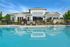 Resort-style pool at Seasons at Orchard Hills in Oak Creek, Wisconsin, with open deck space for resident use and relaxation.