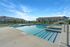 Resort-style pool at Seasons at Orchard Hills in Oak Creek, Wisconsin, with open deck space for resident use and relaxation.