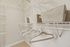 Walk-in closet at Seasons at Franklin Apartments in Franklin, Wisconsin offering additional storage and organization space.