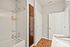 Primary bathroom at Seasons at Orchard Hills in Oak Creek, Wisconsin, featuring clean finishes and practical layout.