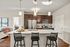 Apartment kitchen at Seasons at Orchard Hills in Oak Creek, Wisconsin, featuring updated finishes and functional storage.