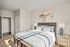 Primary bedroom at Seasons at Orchard Hills in Oak Creek, Wisconsin, with ample space and natural light.