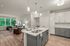 Kitchen at Seasons at Franklin Apartments in Franklin, Wisconsin featuring ample cabinet storage, updated appliances, and functional layout.