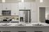 Kitchen at Seasons at Franklin Apartments in Franklin, Wisconsin featuring ample cabinet storage, updated appliances, and functional layout.