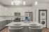 Kitchen at Seasons at Franklin Apartments in Franklin, Wisconsin featuring ample cabinet storage, updated appliances, and functional layout.