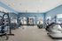 Fitness center at Seasons at Grafton Apartments in Grafton, Wisconsin equipped for a variety of workout routines.