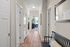 Interior hallway at Seasons at Grafton Apartments in Grafton, Wisconsin connecting living spaces within the apartment home.