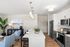 Kitchen at Seasons at Grafton Apartments in Grafton, Wisconsin featuring spacious layouts, modern cabinetry, and functional prep space.