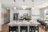 Kitchen at Seasons at Grafton Apartments in Grafton, Wisconsin featuring spacious layouts, modern cabinetry, and functional prep space.