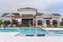 Outdoor pool at Seasons at Grafton Apartments in Grafton, Wisconsin offering space to relax, cool off, and enjoy warmer weather.
