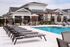 Outdoor pool at Seasons at Grafton Apartments in Grafton, Wisconsin offering space to relax, cool off, and enjoy warmer weather.